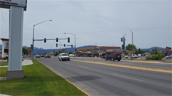 Photo of cars and businesses on Brooks Street.